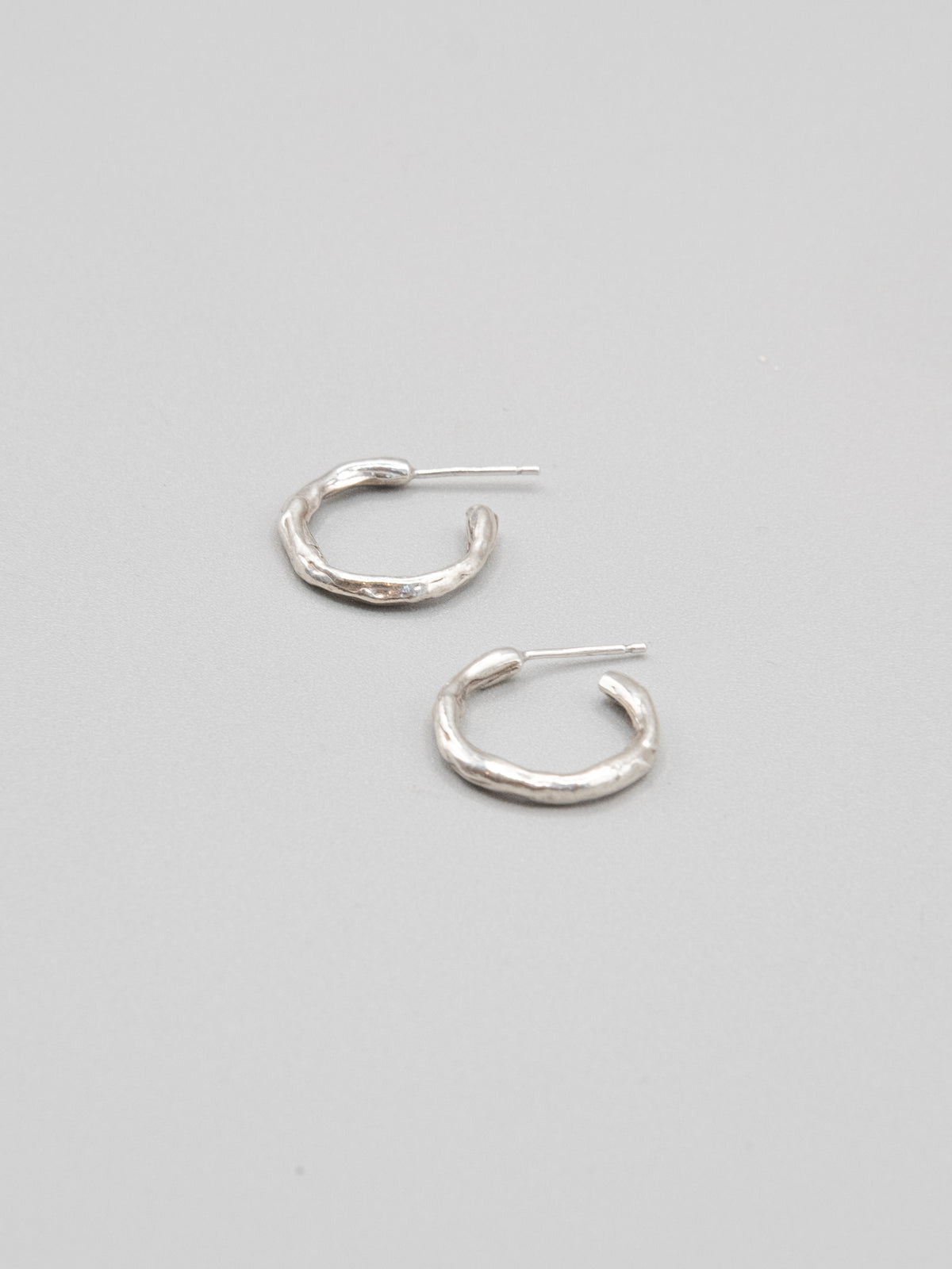Mini Molten Hoops in silver